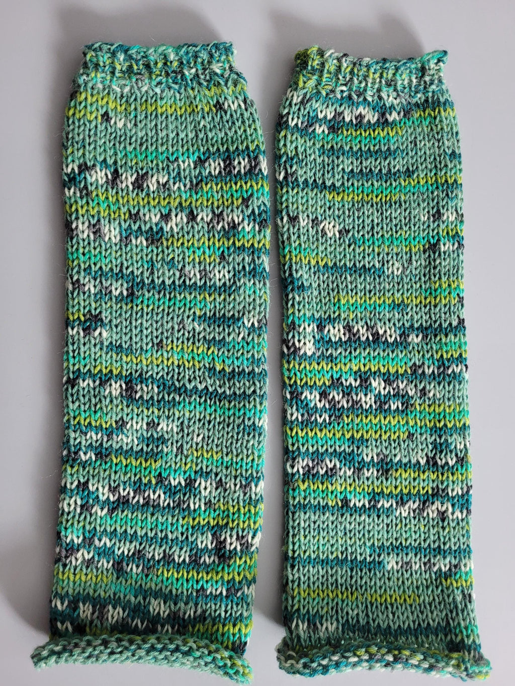 handmade leg warmers,  woolen and warm,  in greens