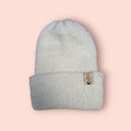 off-white merino wool hat, very soft and fluffy