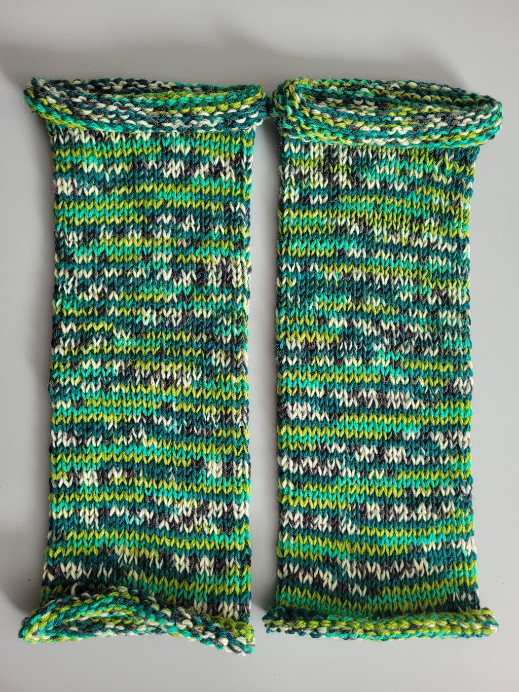 handmade leg warmers,  woolen and breathable,  shades of green,  dark grey and cream