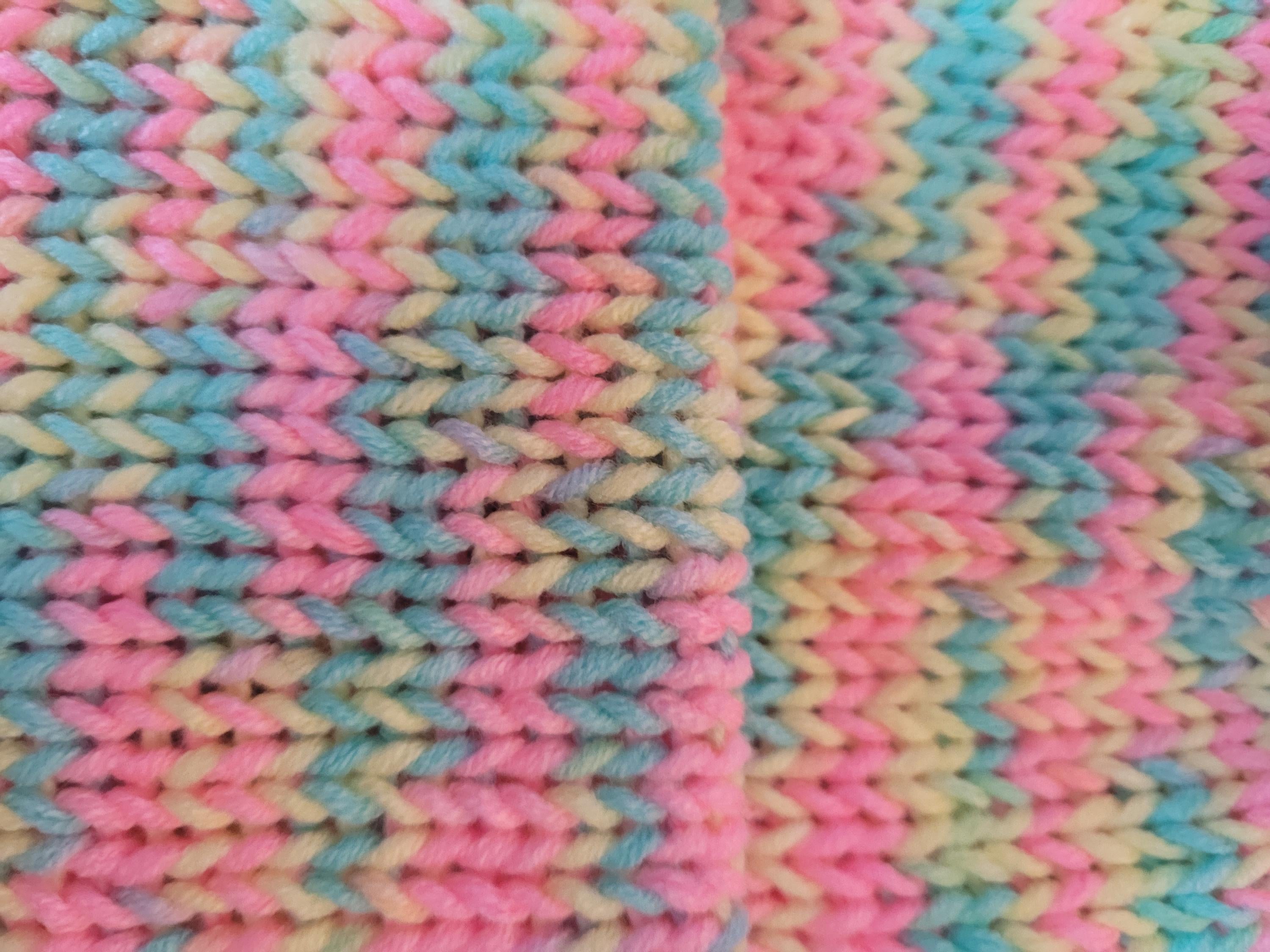 baby 0-3 months beanie hat, neon bright colours, pink and yellow with pompom