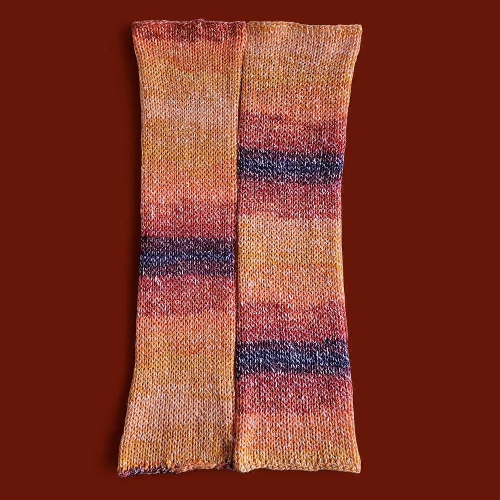 handmade leg warmers, sunset, ombre orange to dark purple, with acrylic and cotton